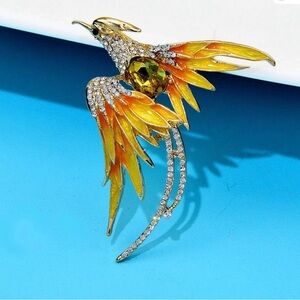 Elegant Gold and Orange Bird Brooch